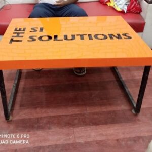 Office table acrylic laser cut company name with metal table